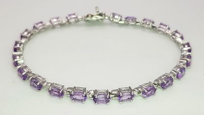 A Pretty Sterling Silver and Amethyst Set Tennis Bracelet-19.5cm Length. Set with Twenty-Two 