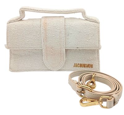 A Jacquemus Le Chiquito Beige Textured Top Handle Bag. Beige textured fabric exterior with 