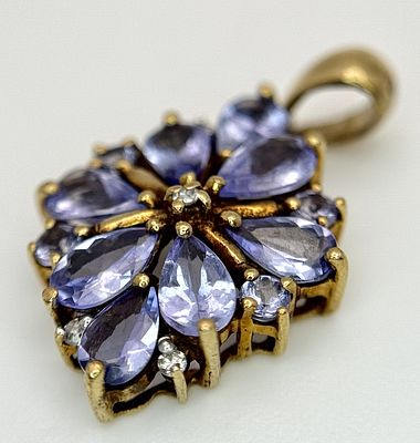 9K yellow gold iolite and diamond pendant, 0.02ct diamond weight, 1.7g total weight. SH6123H