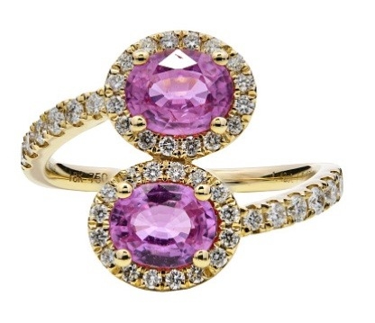 An 18K Yellow Gold natural Pink Sapphire and Diamond Crossover Ring