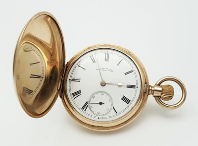 An Antique 14K Gold Plated Doubled Cased Full Hunter A.W.W. Waltham Pocket Watch. Top winder. 