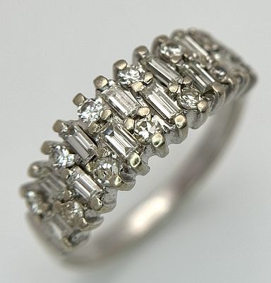 AN 18K WHITE GOLD, MIXED CUT, DIAMOND SET RING. 0.25CTW. 4.9G, SIZE M. JB 2007