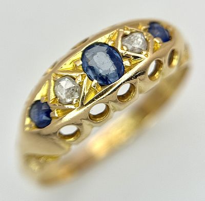 AN 18K YELLOW GOLD, ANTIQUE, DIAMOND AND SAPPHIRE SET RING. 3.1G, SIZE P. TAN 2001