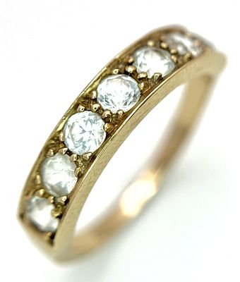 A 14K Yellow Gold (tests as) White Stone Half Eternity Ring. Size L 1/2. 2.7g total weight.