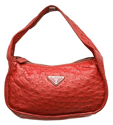 A Red Prada Ostrich Effect Leather Crossbody Bag. Red ostrich effect leather exterior with 