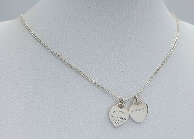 A Tiffany & Co. 925 Silver Double Tag Pendant Necklace and An Additional Pendant/Charm. Approx 
