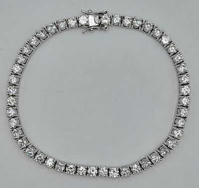 A Sterling Silver Diamonique Cubic Zirconia Set Tennis Bracelet-19cm Length. Set with Forty-Six 