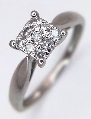 A 9K WHITE GOLD, DIAMOND SET RING. 0.15CTW. 1.7G, SIZE N. SC 2038