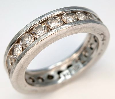 A 925 Silver Clear Stone Set Eternity Ring. Size O 1/2. Total weight: 7.24g.