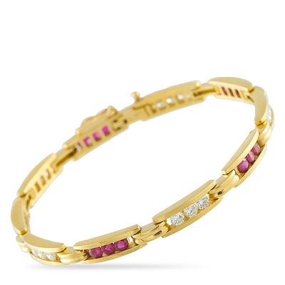An 18K Yellow Gold 1.0ct Diamond and Ruby Bracelet. Channel-set Diamonds with a total weight of 