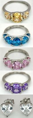 Four Stone Set Silver Rings (adjustable) and a Pair of Moissanite Silver Stud Earrings with a 