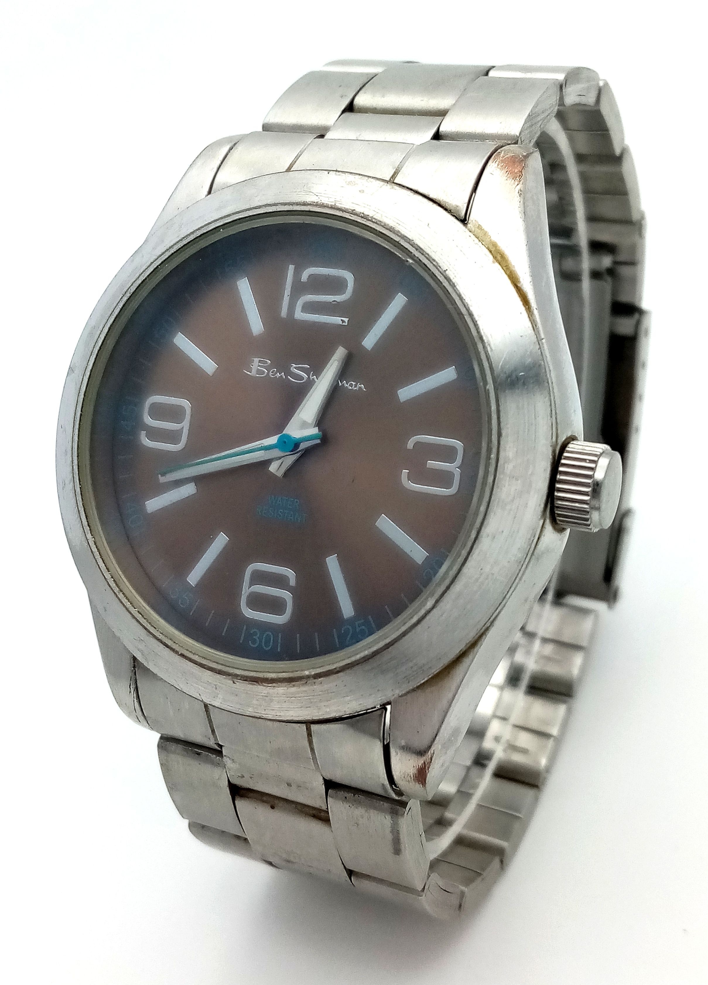 A Ben Sherman, Steel, Brown Dial With Blue Accents, Bracelet Watch