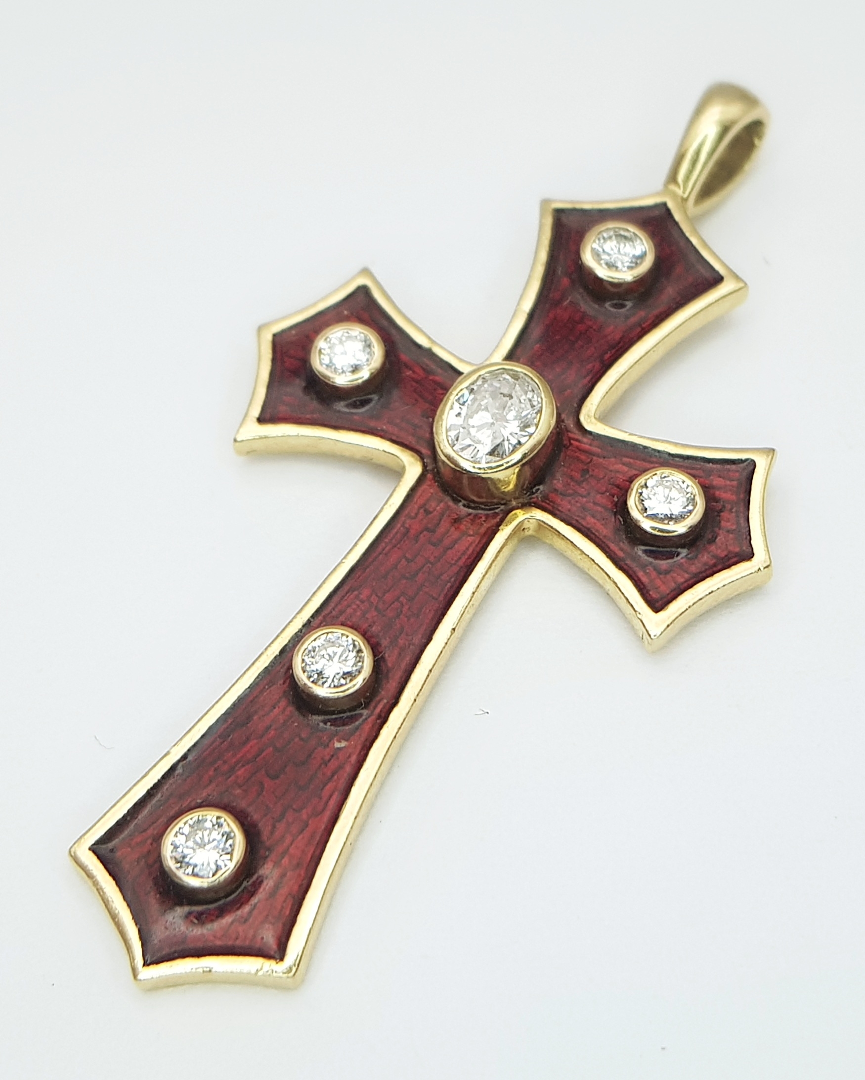 An 18K Yellow Gold, Enamel and Diamond Celtic Cross Pendant. c.0.80ctw of round