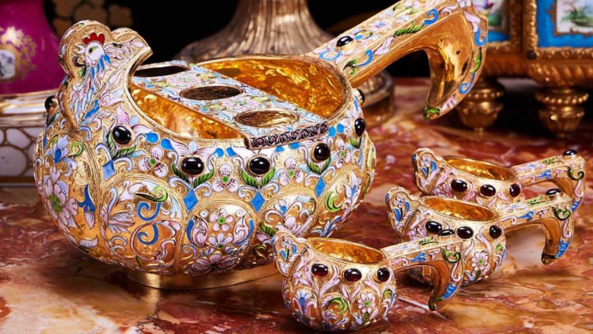 A Russian Style Fine Silver Gilt and Coisonne Enamel Bird Kovsh Set