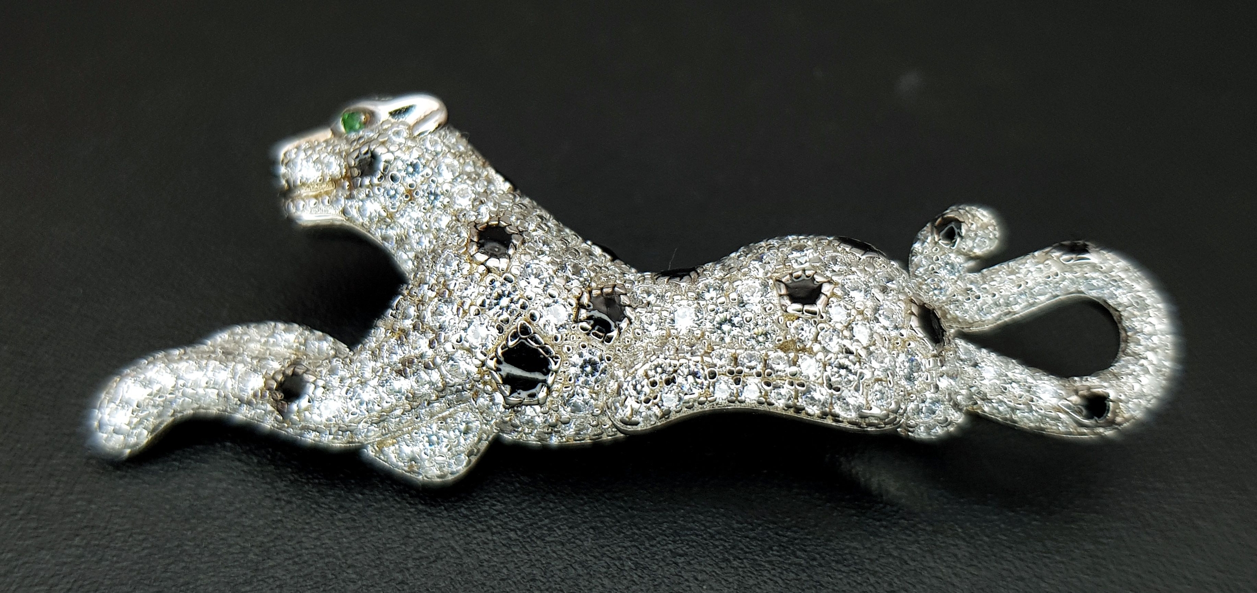 A 925 Silver White Stone Leopard Brooch with Green Stone Eyes and Black Enamel