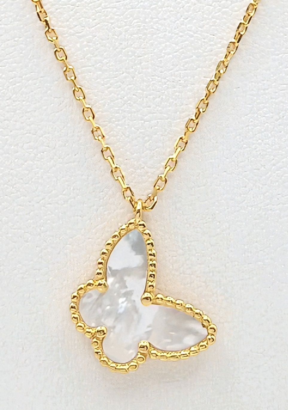 A 925 gilded Silver Necklace with a Mother of Pearl Butterfly Pendant