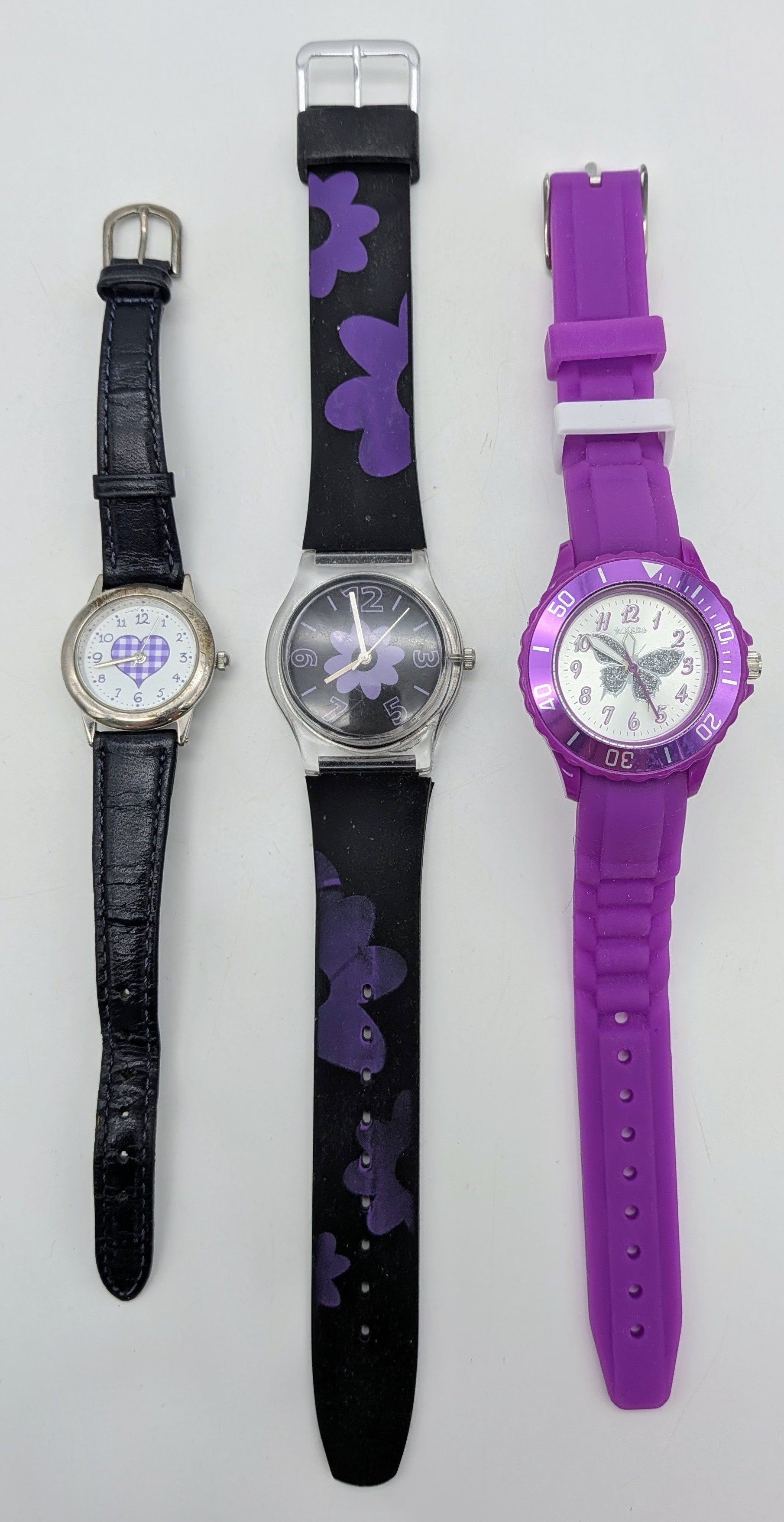 A Selection Of 3, Purple Themed Watches, Butterfly By Tikkers