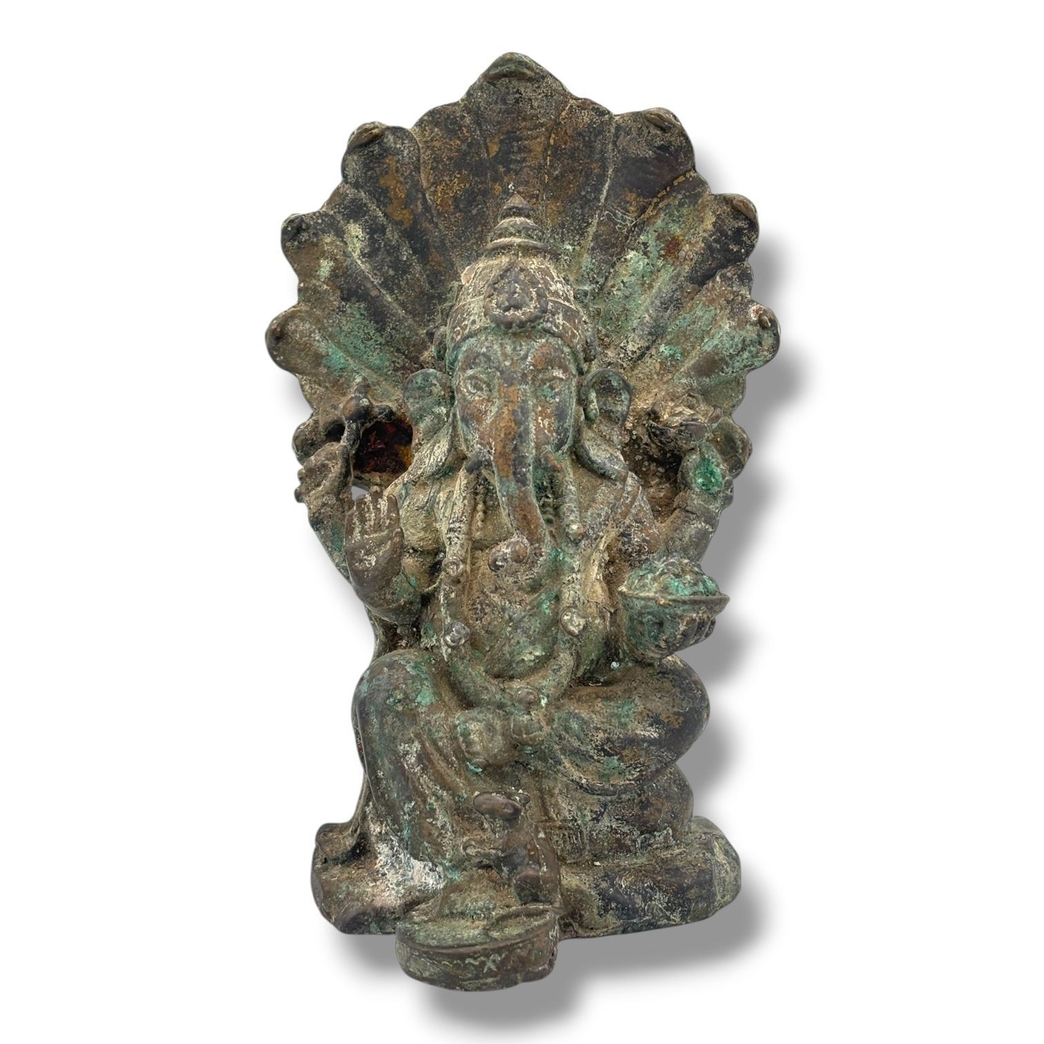 An antique Asian Patinated Bronze Seated Ganesha Figure