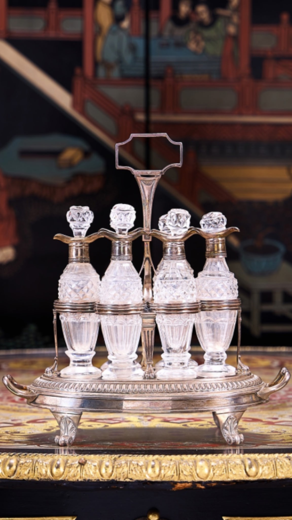 A George III Regency Sterling Silver and Glass Cruet Set by Paul Storr