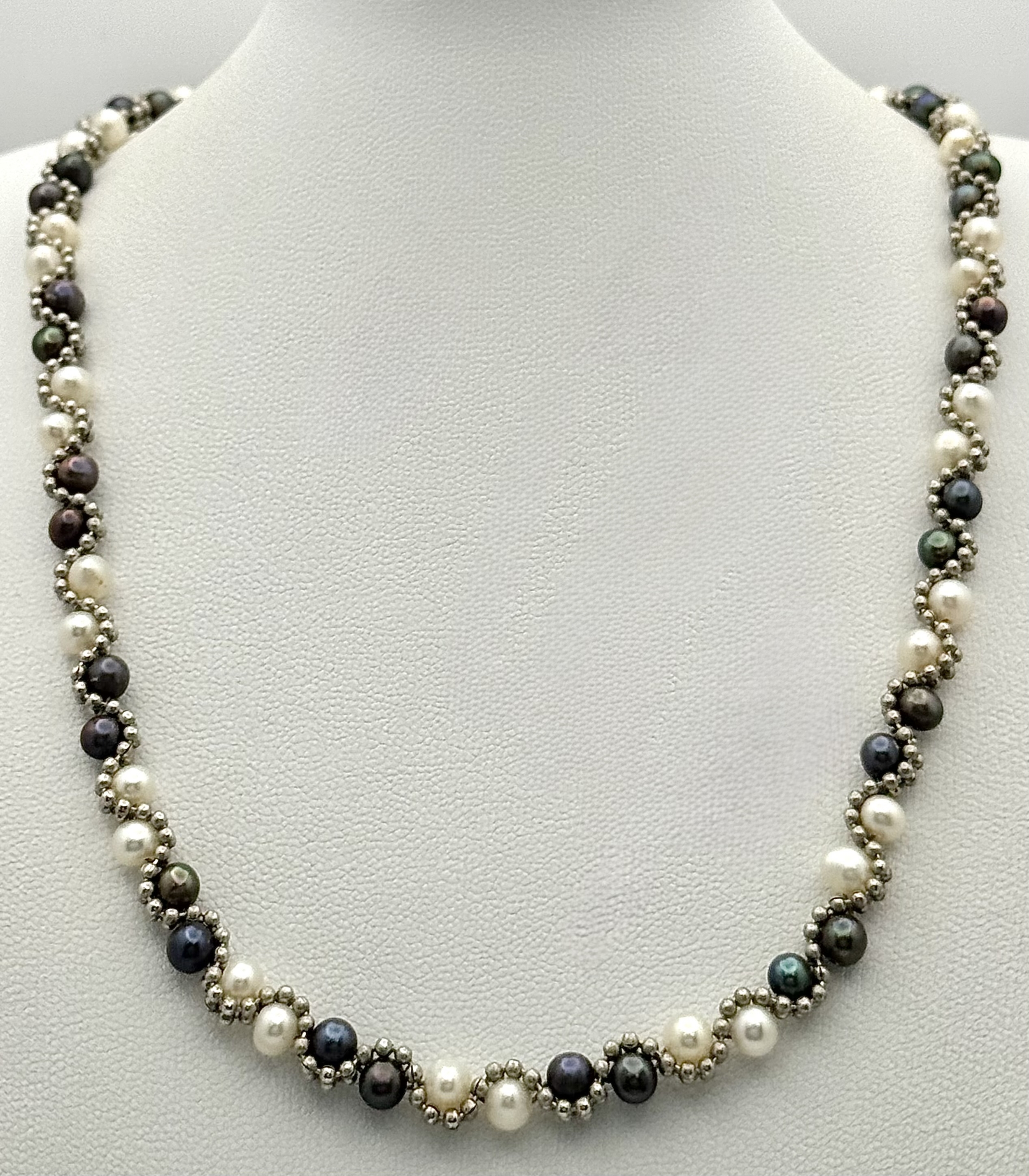 A pretty multi-color Freshwater Pearl woven necklace