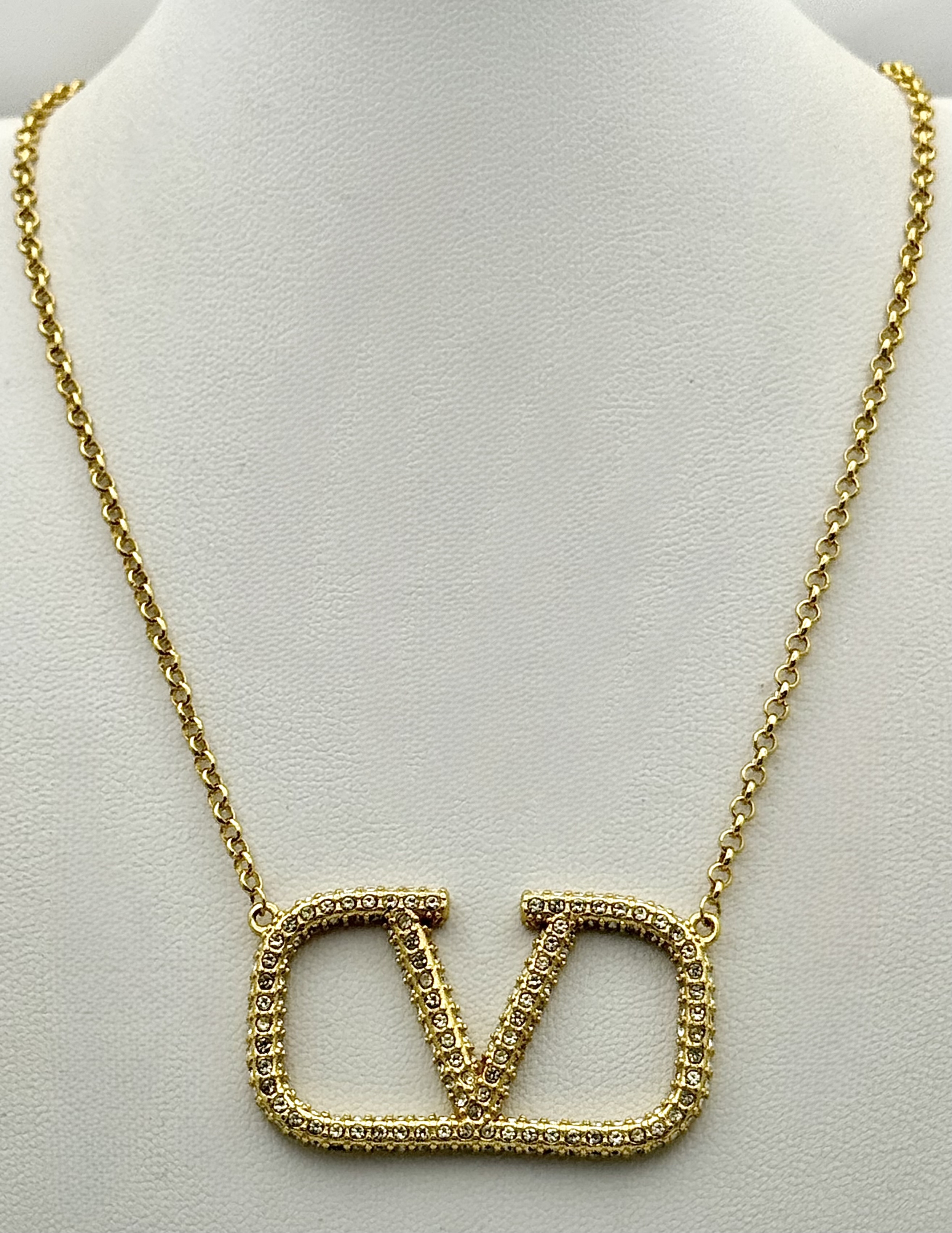 A Valentino Garavani VLogo Signature Necklace in Gold-Tone Metal