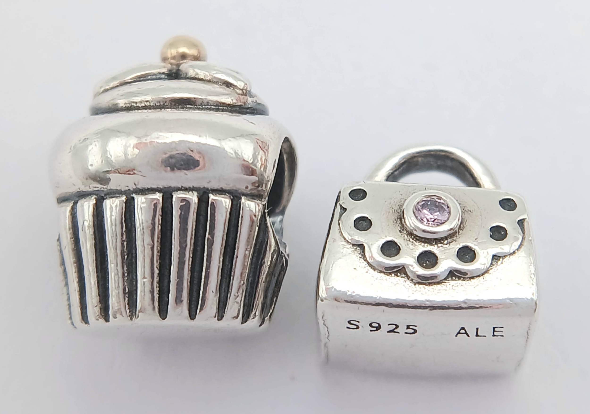 A Pair Of Pandora, Sterling Silver Charms