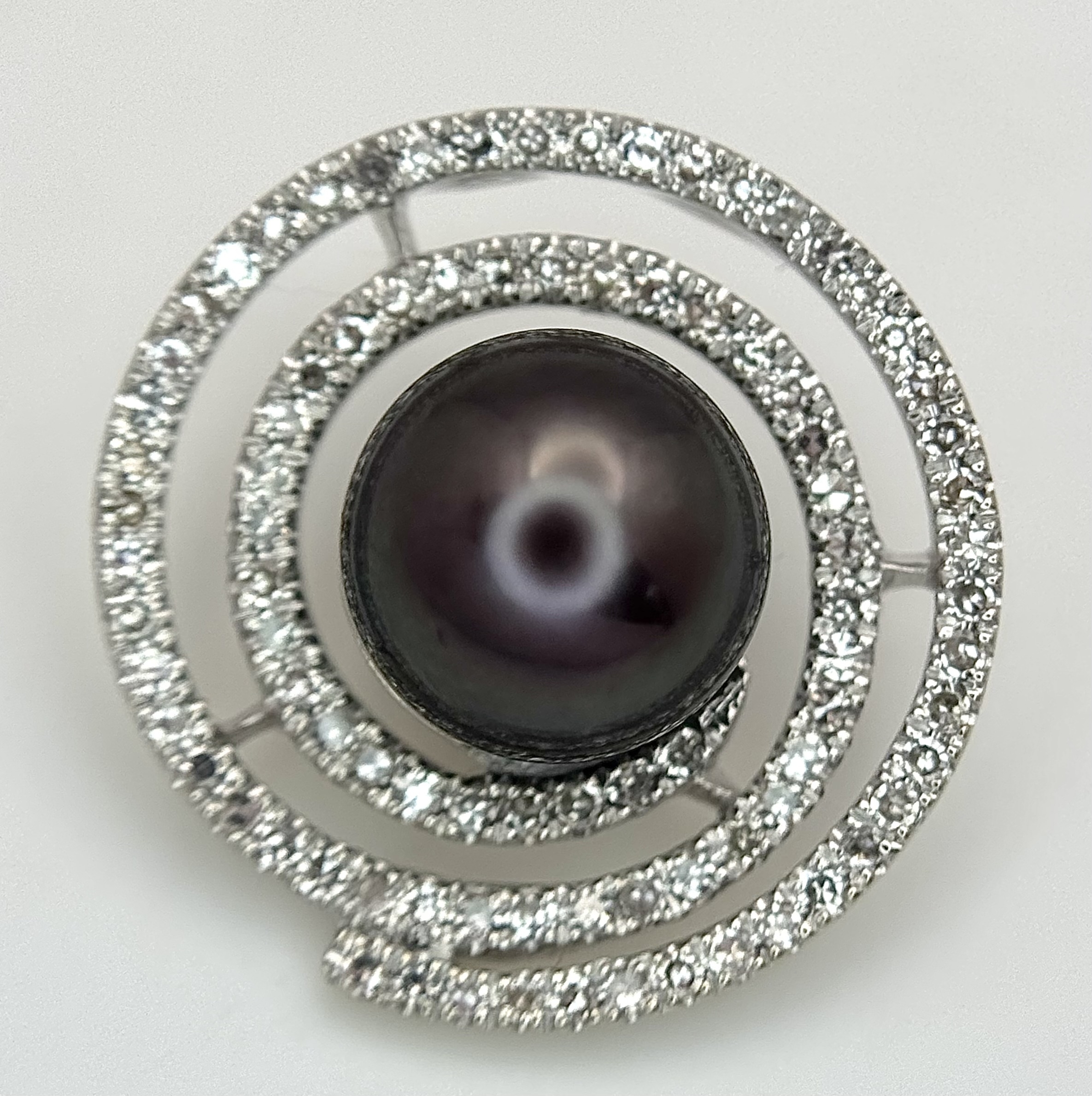 A 14K White Gold (tests as) Tahitian Pearl and Diamond Hurricane Eye Pendant