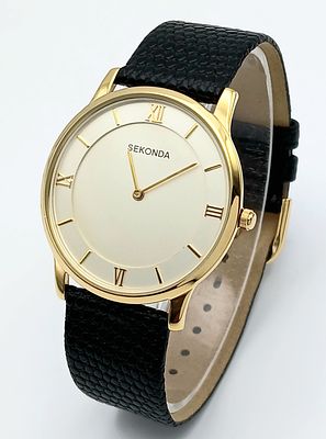 A Men’s Gold Tone Sekonda Date Watch.37mm Case. Battery replaced June 2026. Comes Boxed with papers