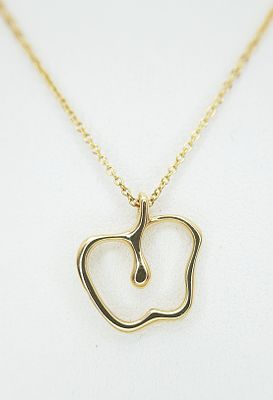 A Tiffany and Co, 18K Gold (Peretti) Apple Pendant on a Tiffany and Co. 18K Gold Chain 