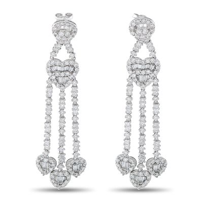 A pair of 18K White Gold 3.60ct Diamond Heart Drop Earrings. Crafted in 18K White Gold, the 