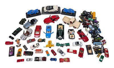 A box of loose die cast cars. To include Corgi, Matchbox and Hotwheels.