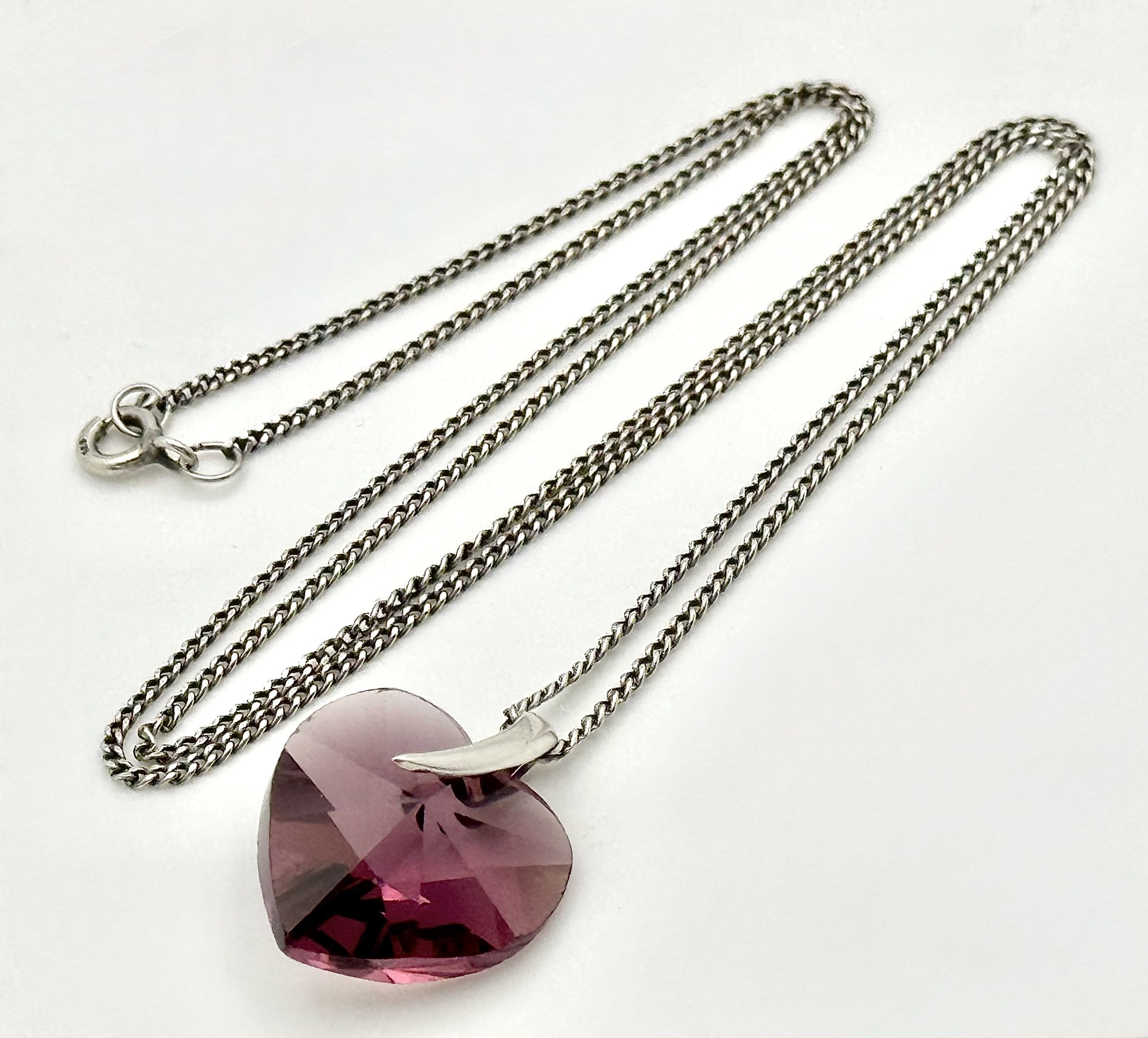 A Silver Chain with Purple Stone Heart Pendant