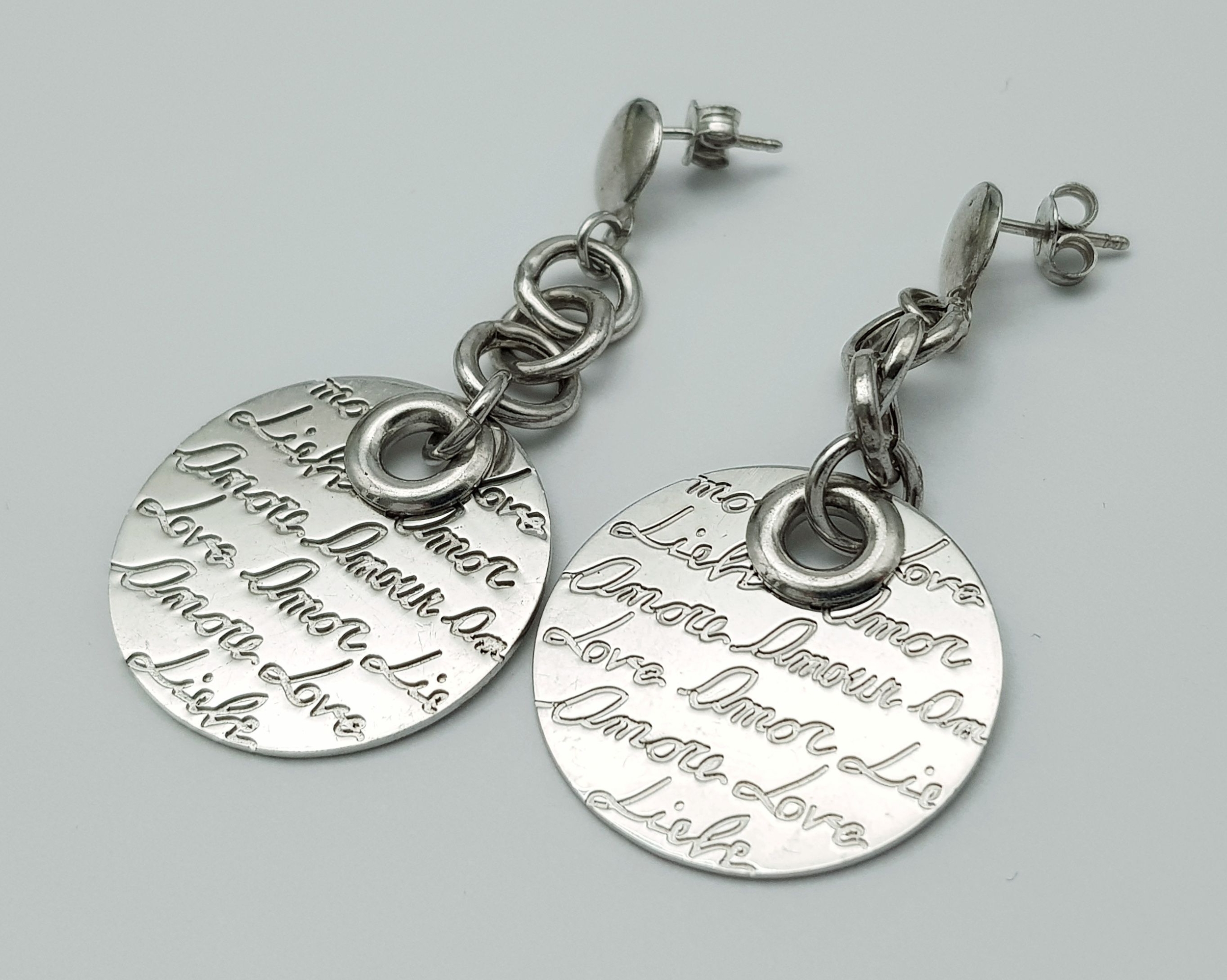 A Pair Of Sterling Silver, Drop Earrings