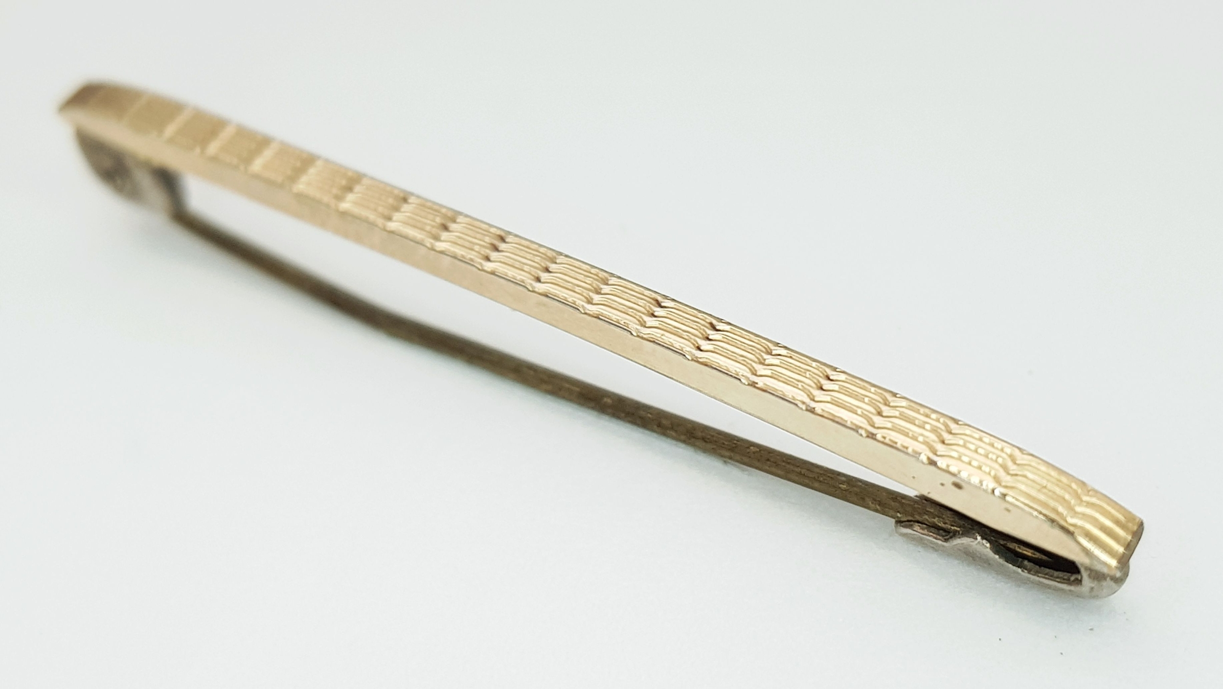 A 9K Gold and Silver Safety Pin Brooch