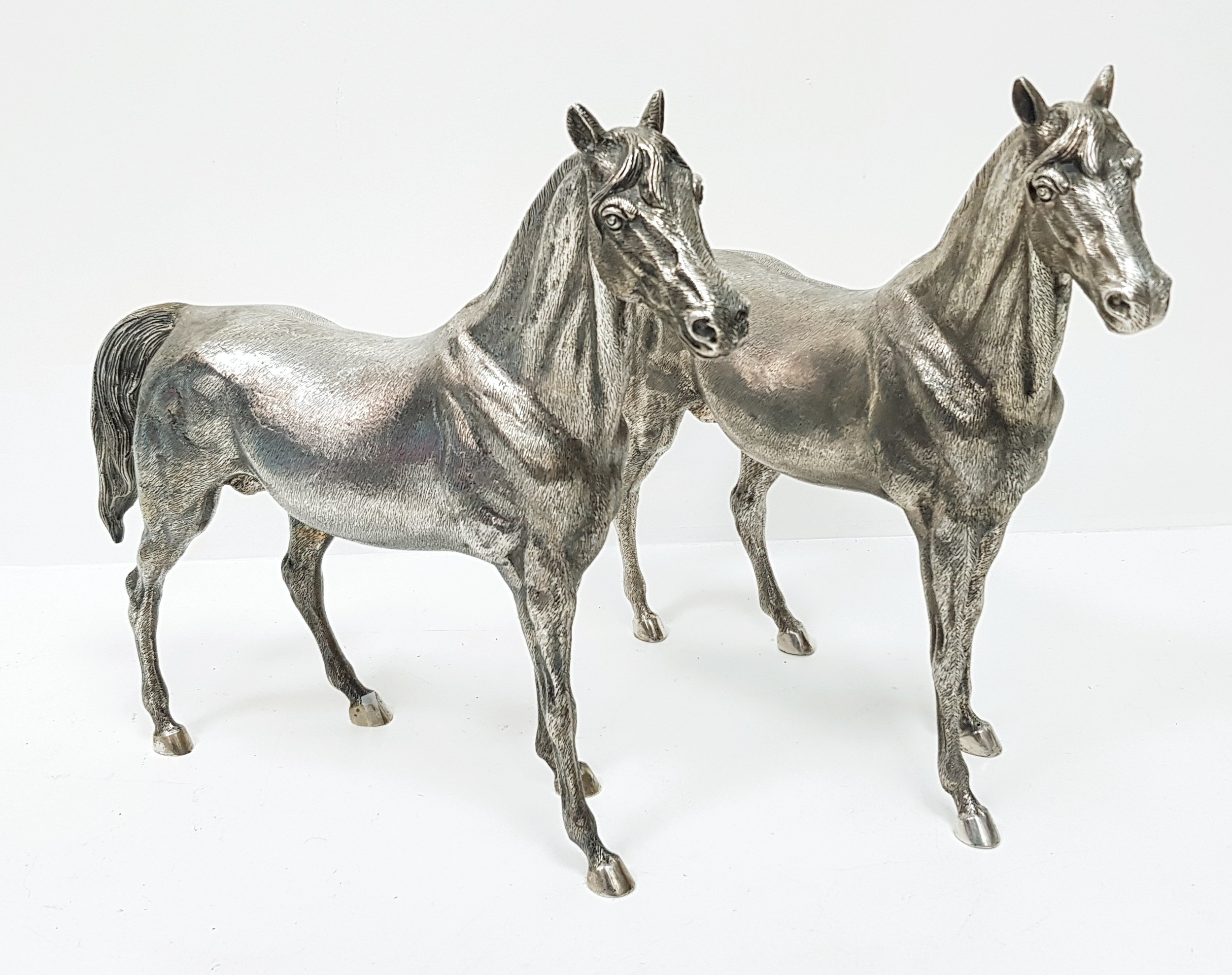 A Stunning Pair of Large 20th Century Silver Spanish Thoroughbreds