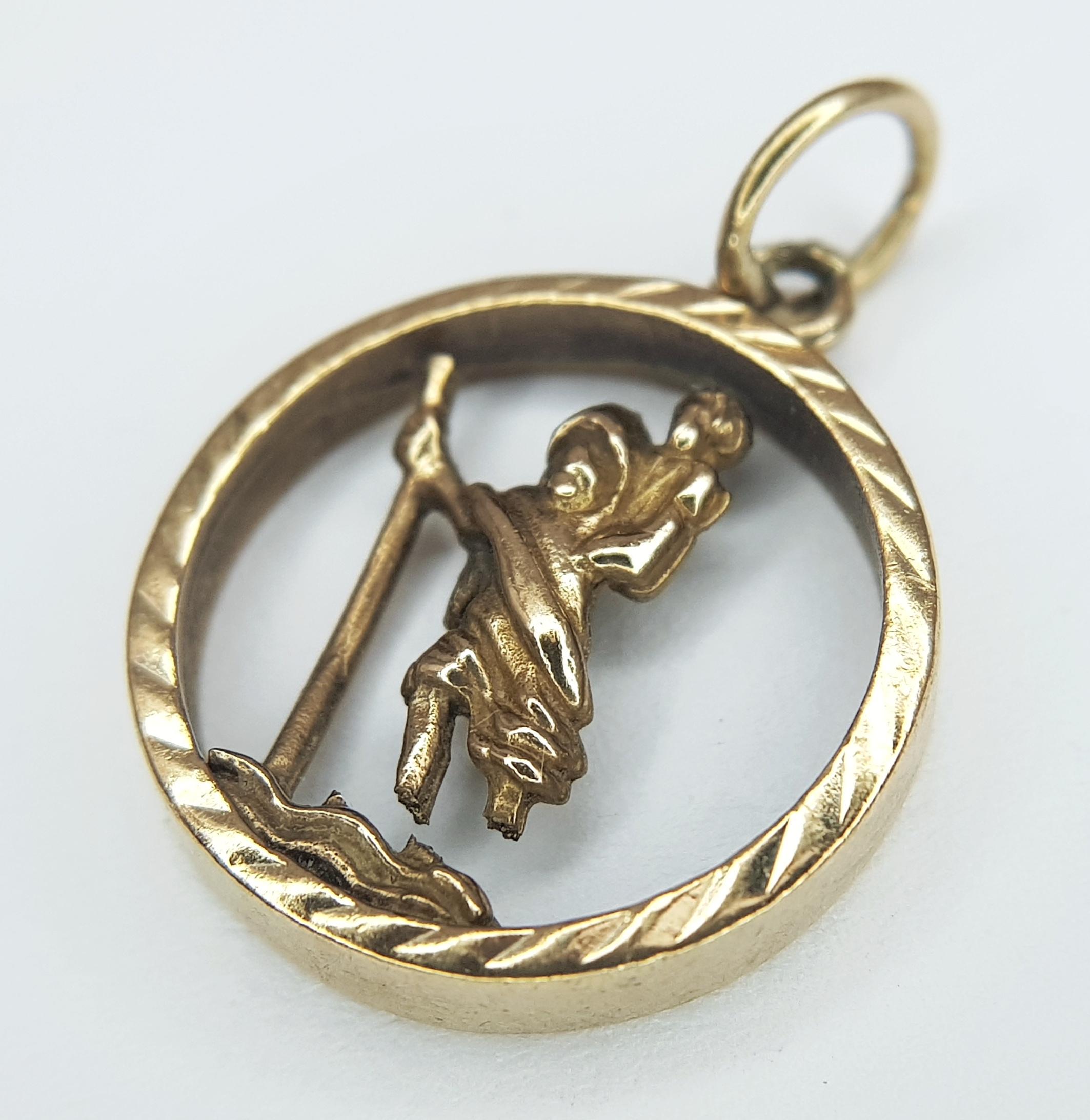 A 9K Yellow Gold Circular St. Christopher Pendant
