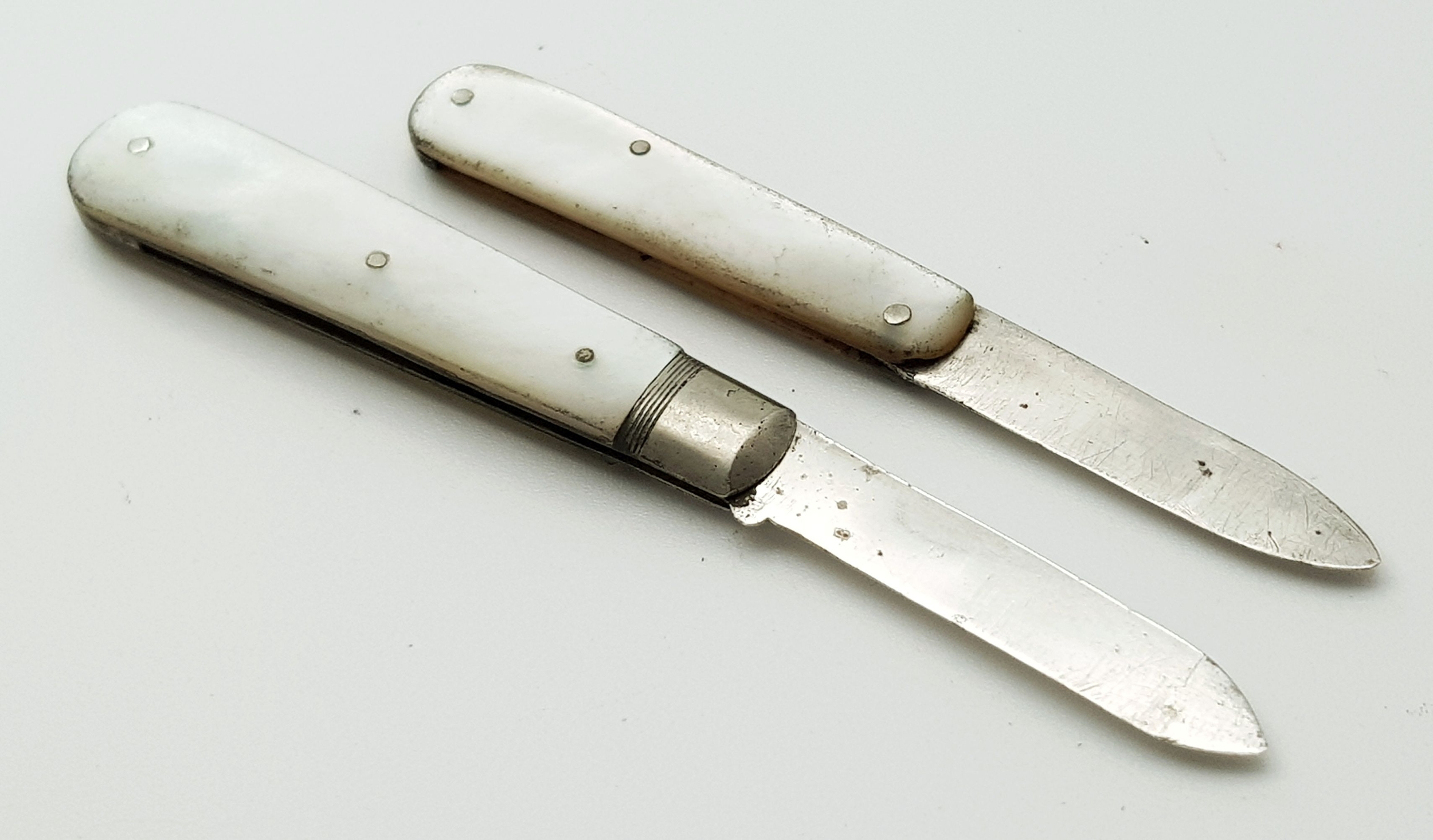 Two Antique Sterling Silver and Mother of Pearl Small Fruit Knives