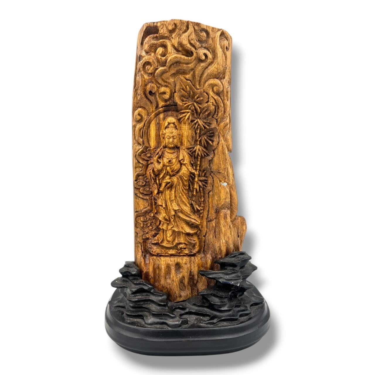 A hand Carved natural Agarwood Guanyin Figure on Stand