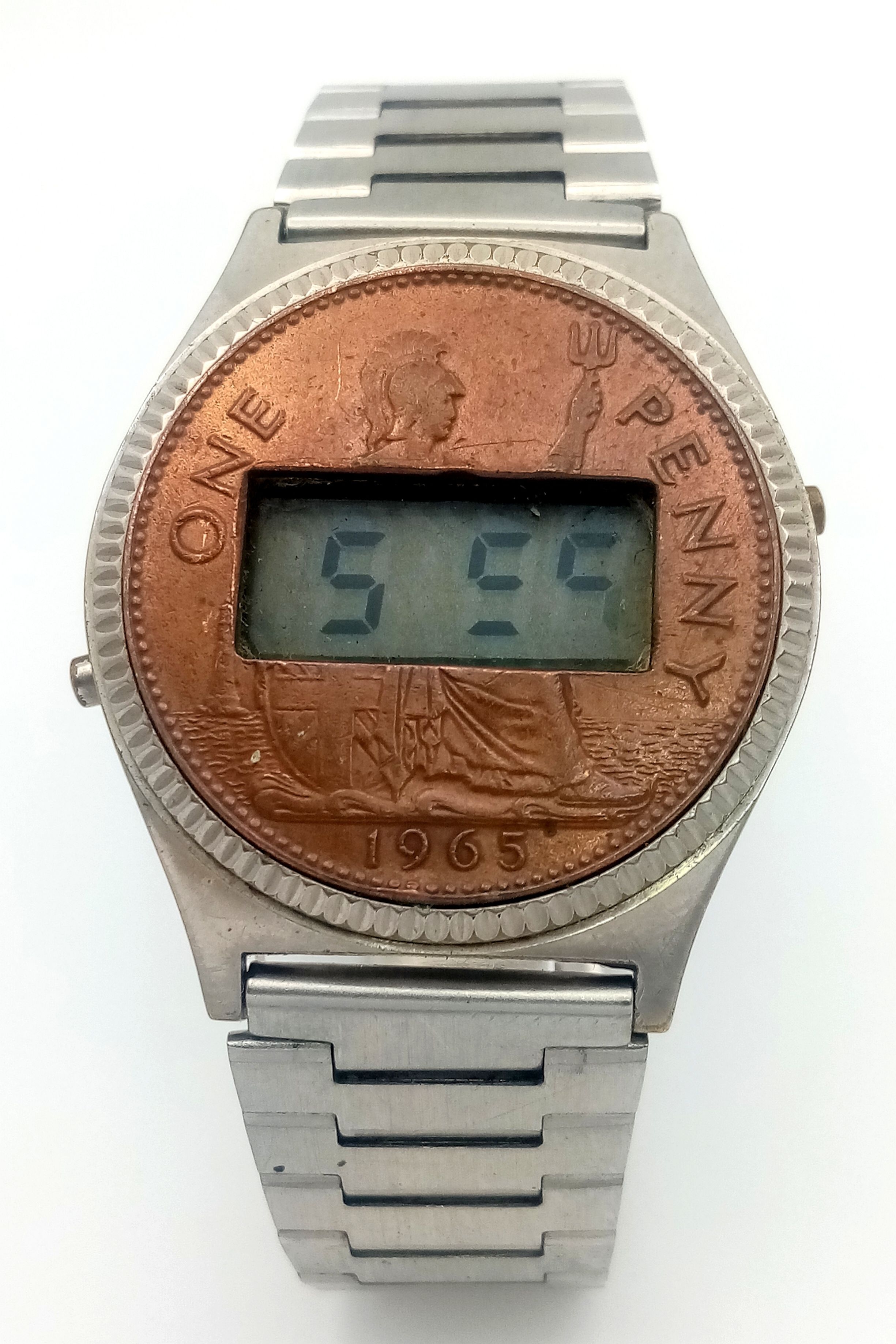 A 1965, ONE PENNY DESIGNED, DIGITAL WATCH