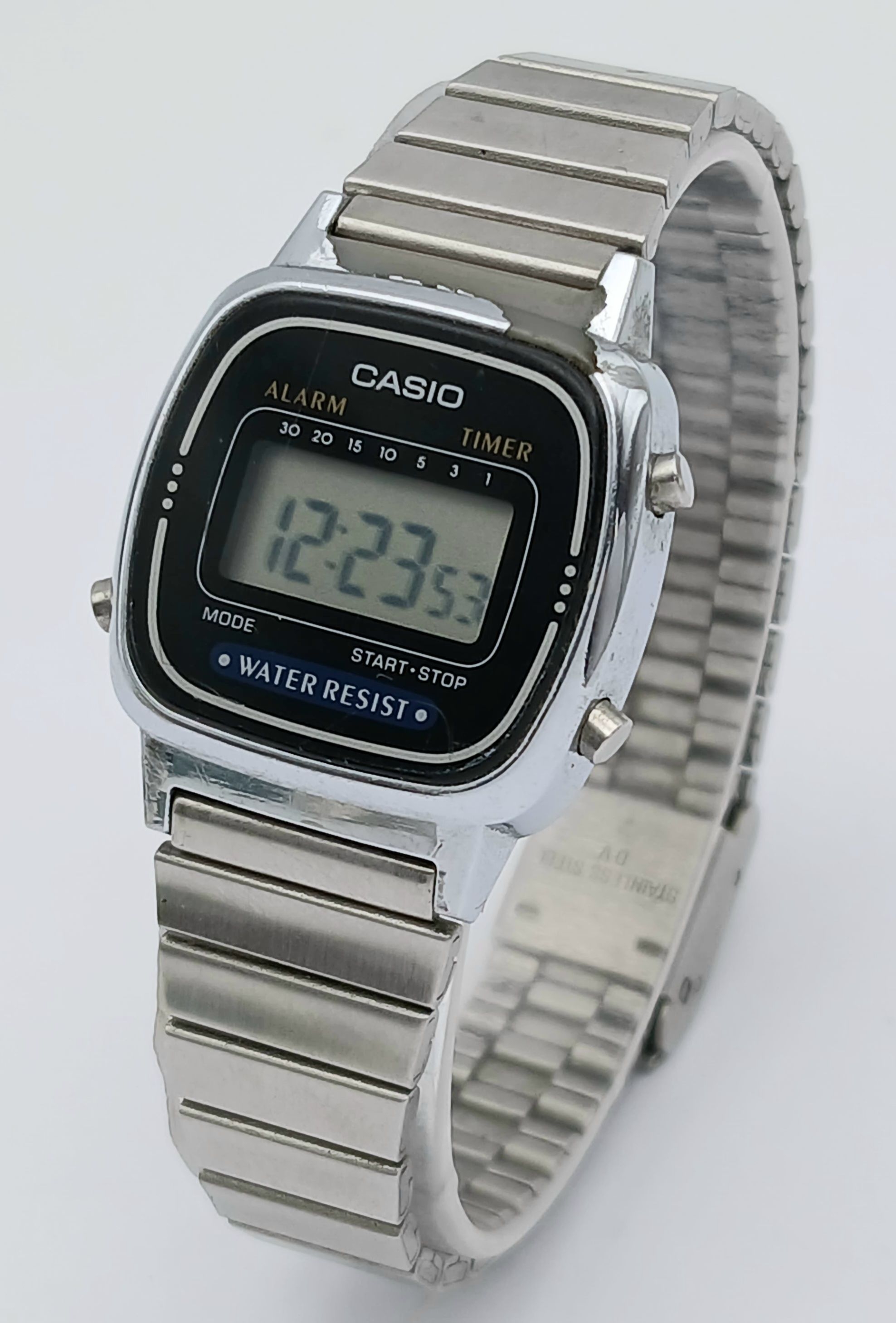 A CASIO, ALARM, TIMER, DIGITAL, STEEL BRA CELET WATCH