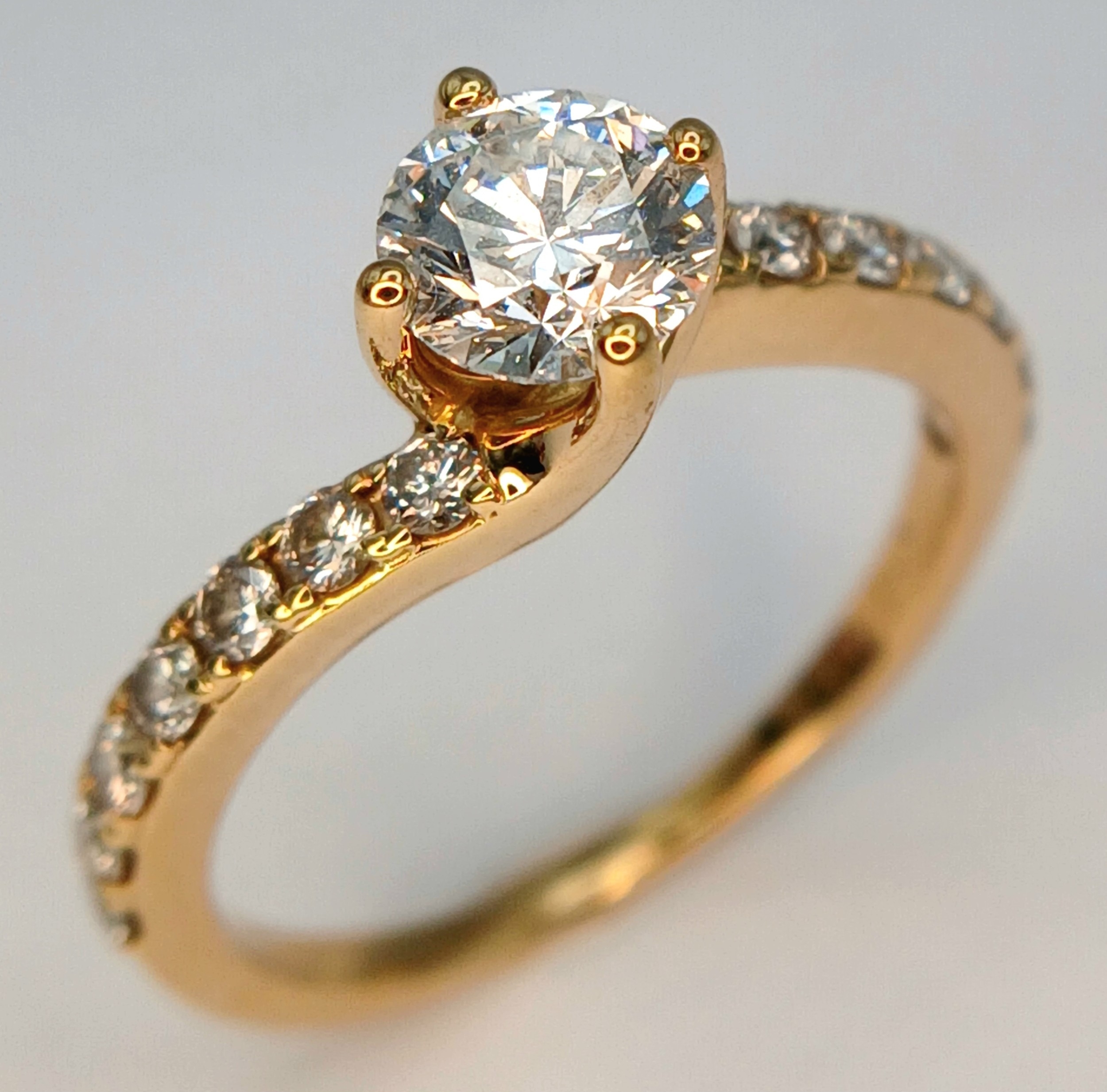 A GIA Certified Diamond Crossover Ring