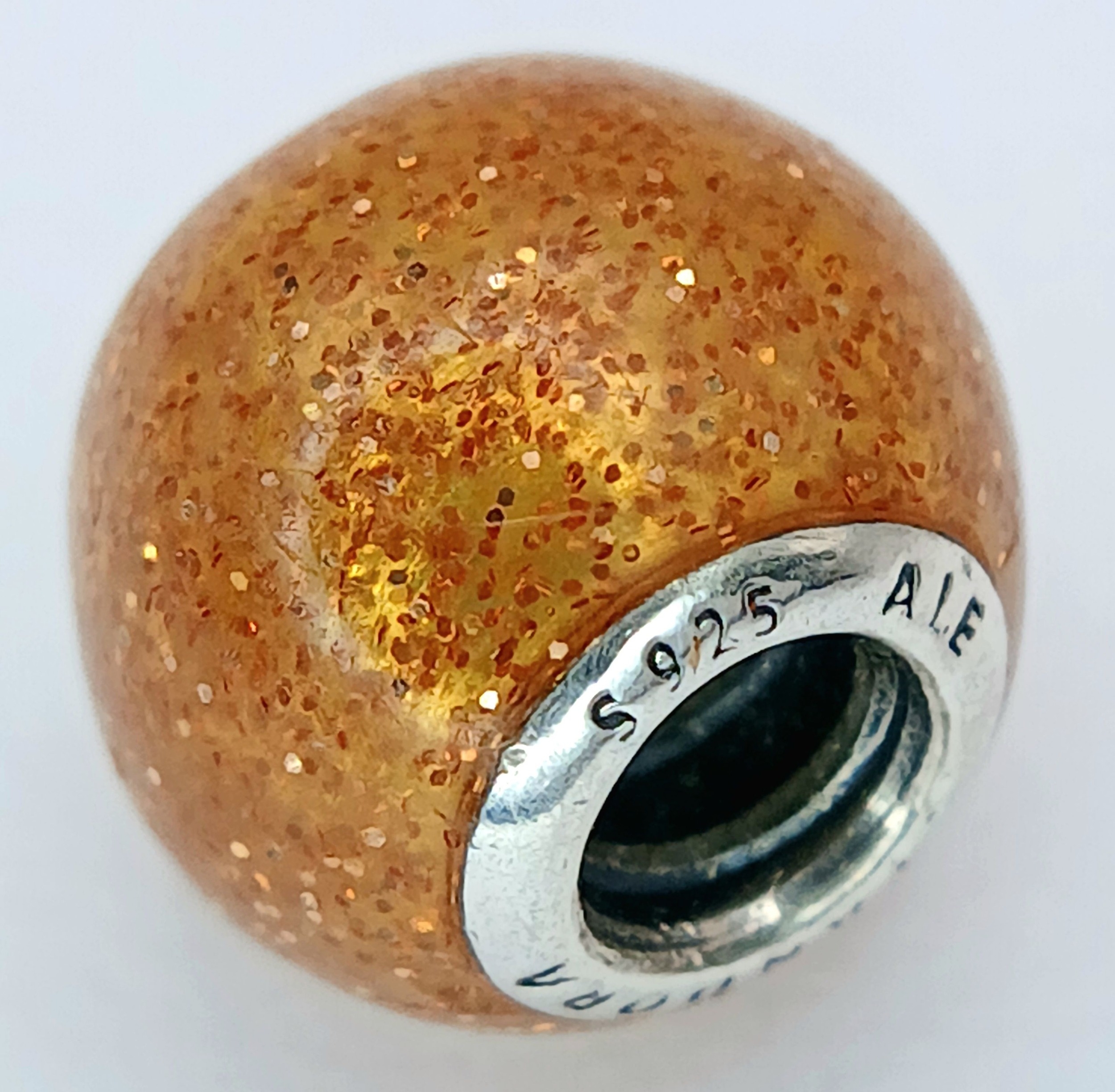 A PANDORA, STERLING SILVER, GOLDEN GLITTER BALL CHARM