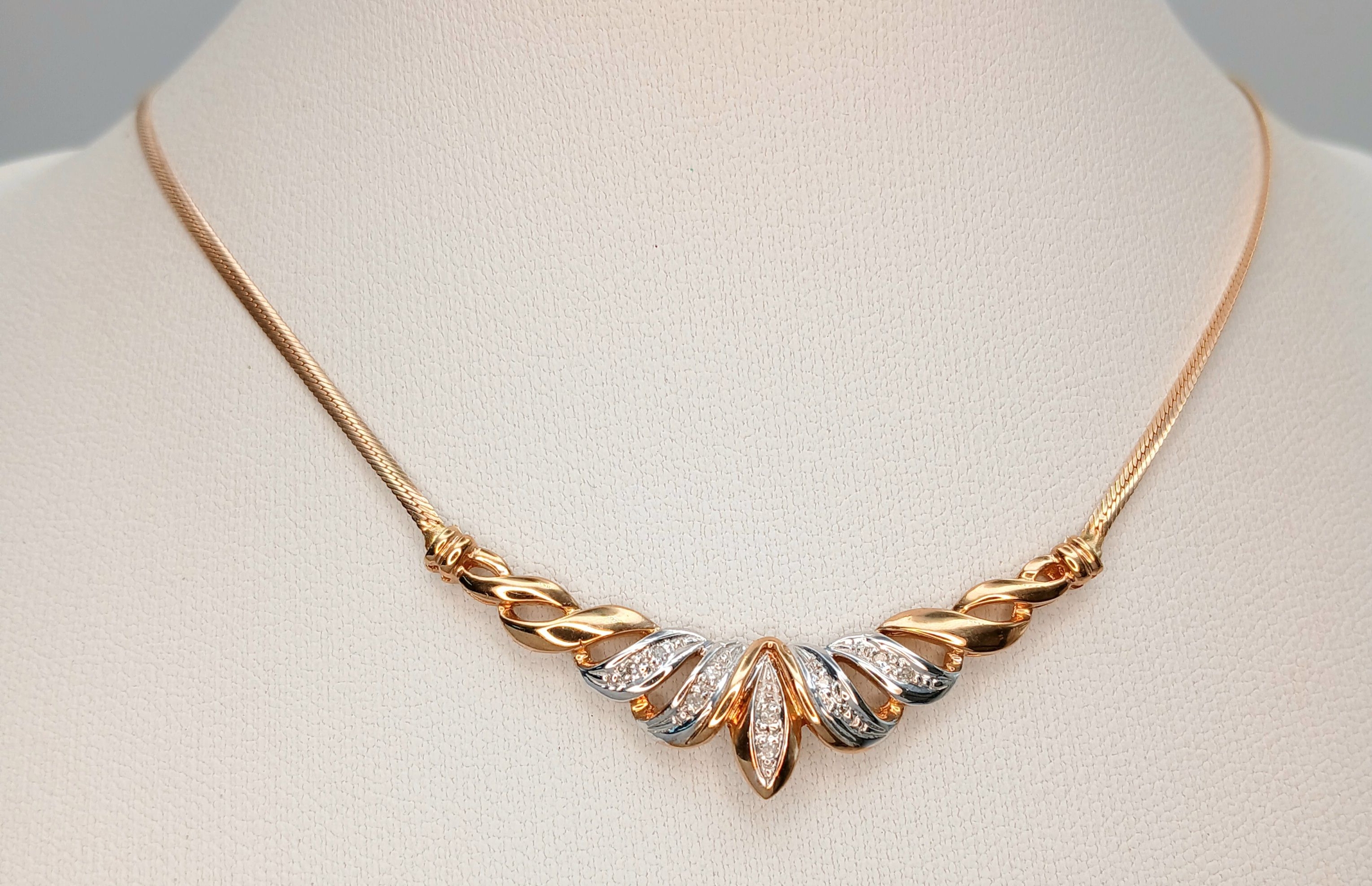 A 9K Yellow Gold and Diamond Lavaliere Necklace