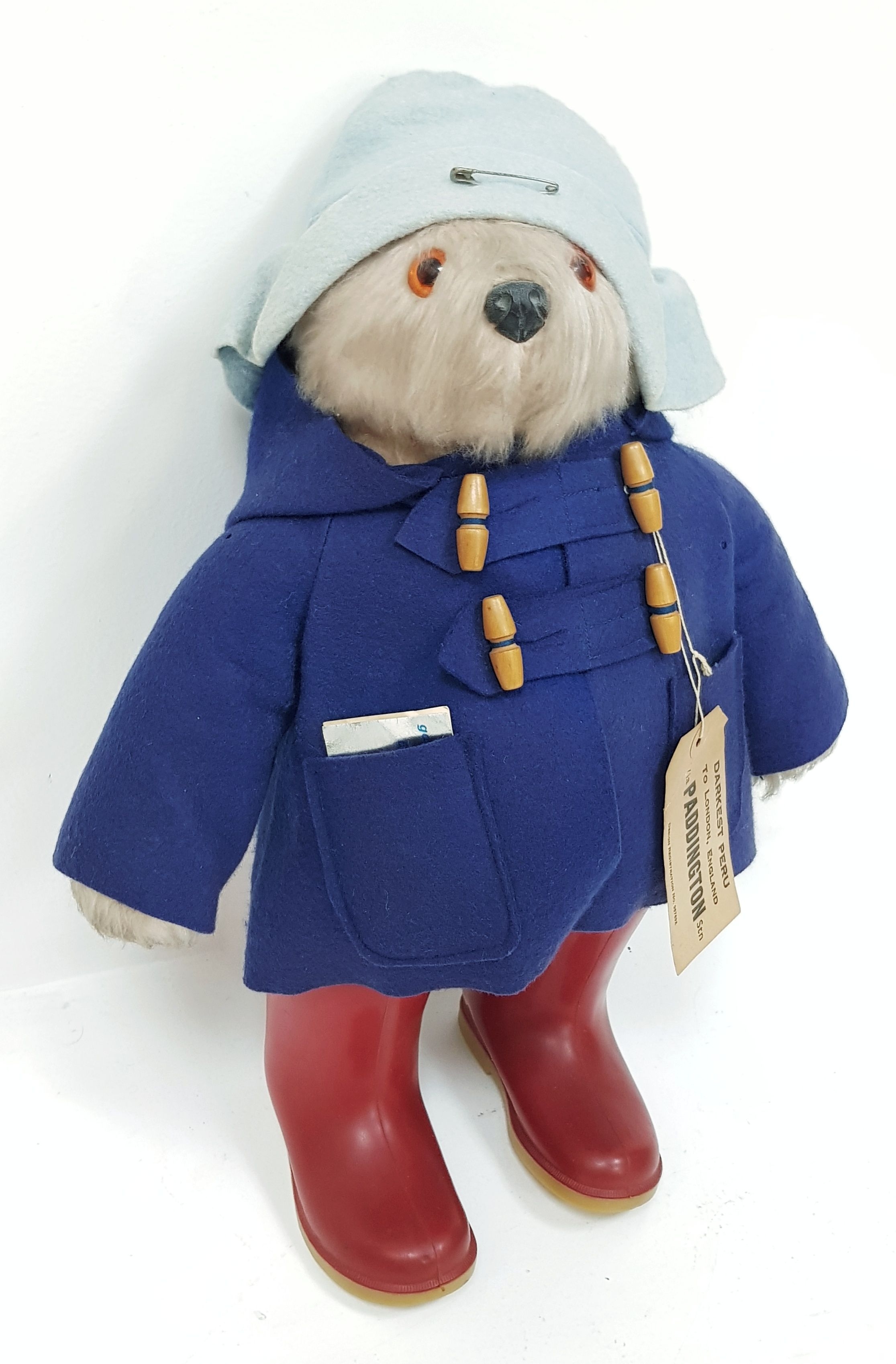 A VINTAGE (CIRCA 1975) PADDINGTON BEAR WITH THE ORIGINAL TICKET AND CERTIFICATE
