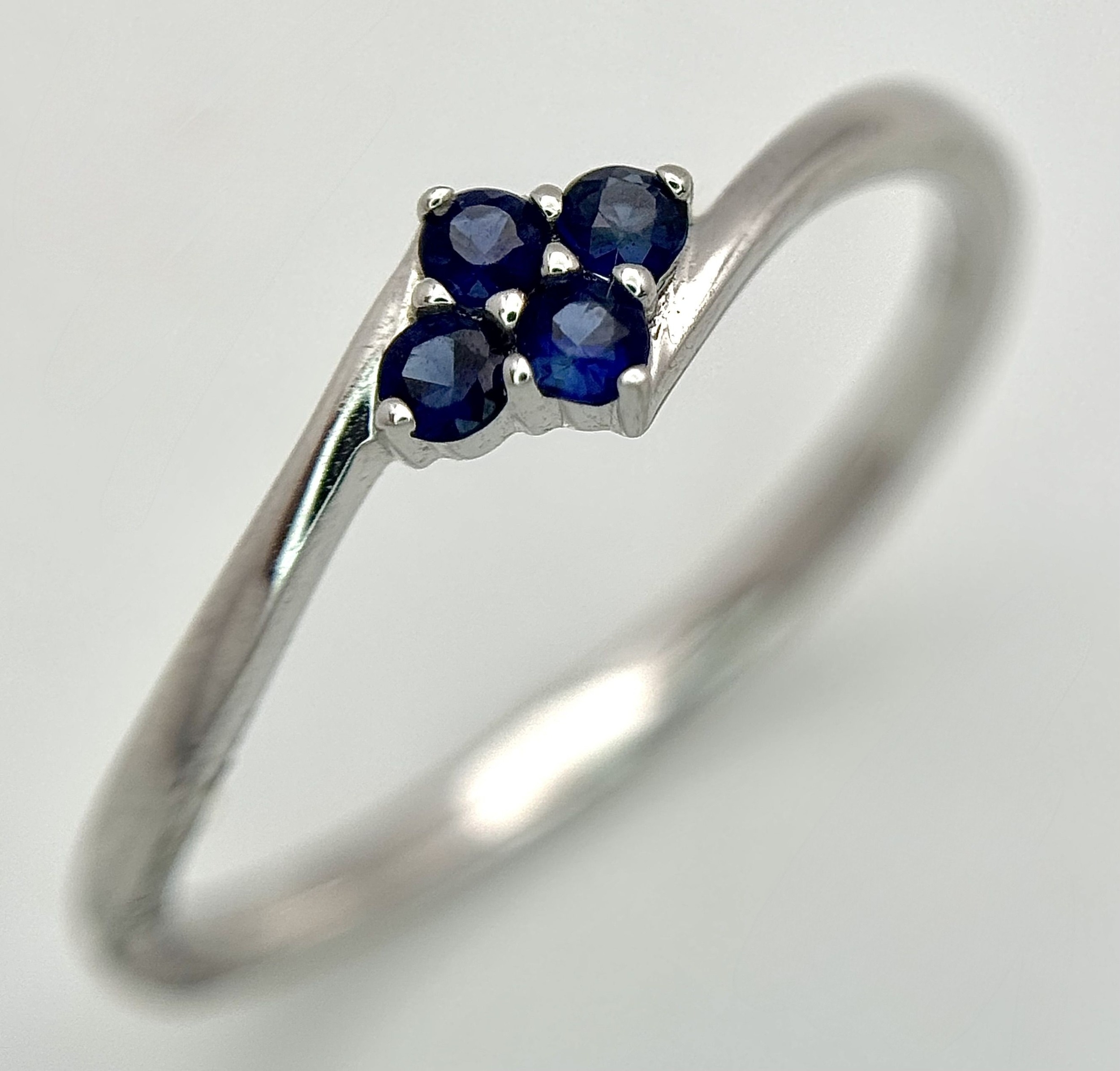 An 18K white gold sapphire ring, 0.04ct sapphire weight, 1.4g total weight
