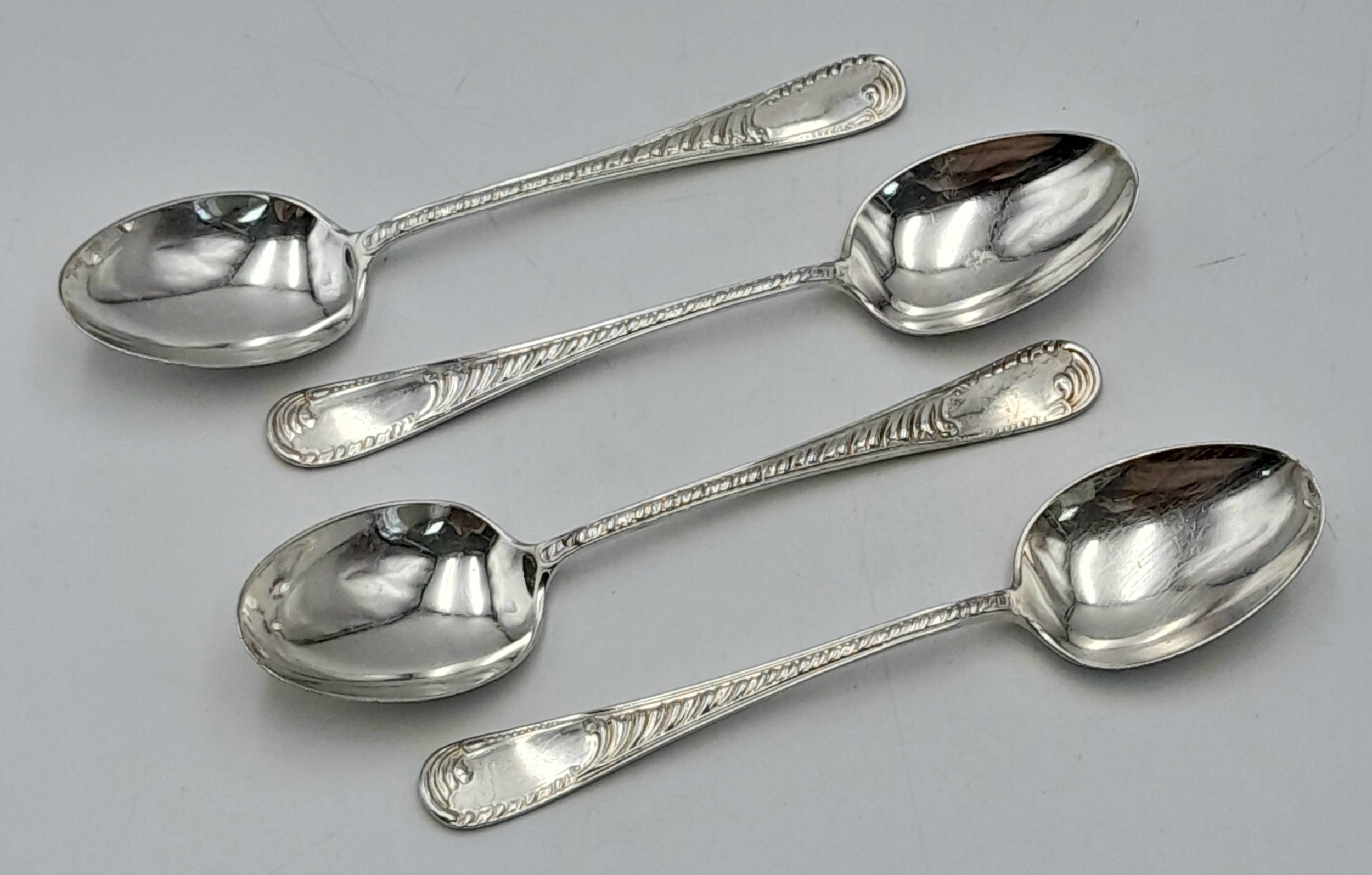 4 SILVER TEASPOONS HALLMARKED SHEFFIELD 1903 . 40.1gms