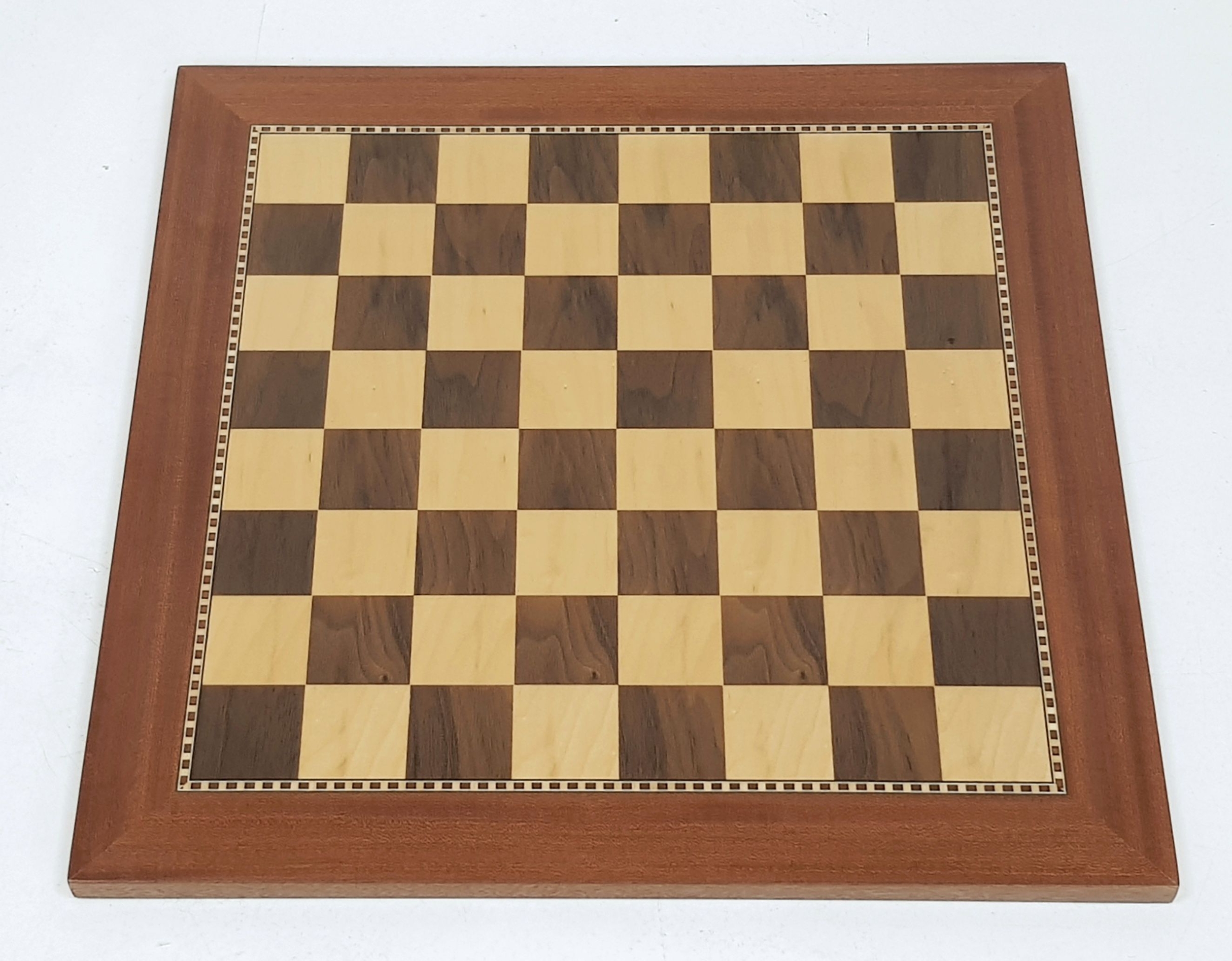 A Wooden Chess Board. Walnut and sycamore squares with a mahogany surround