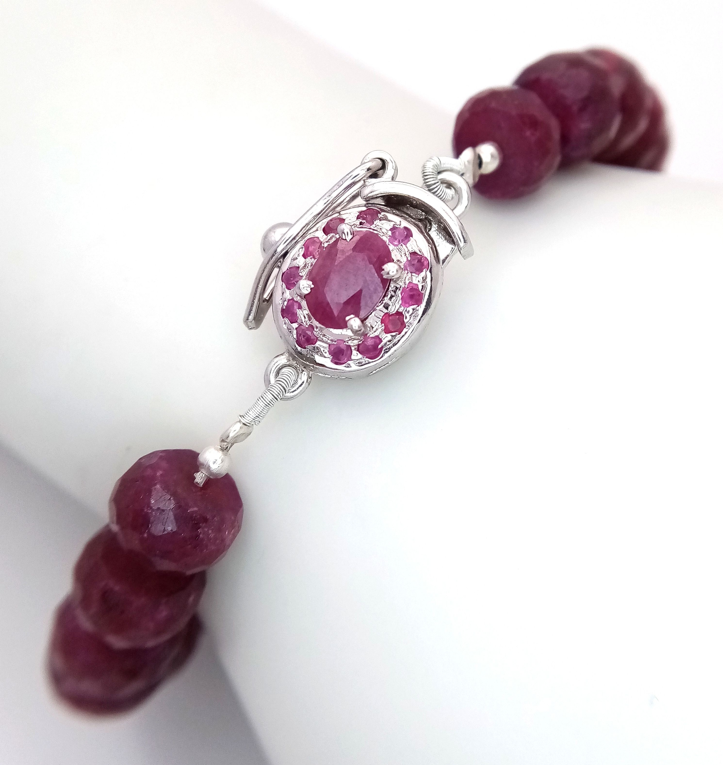 A Faceted Ruby Rondelle Gemstone Bracelet with Ruby and 925 Silver Clasp