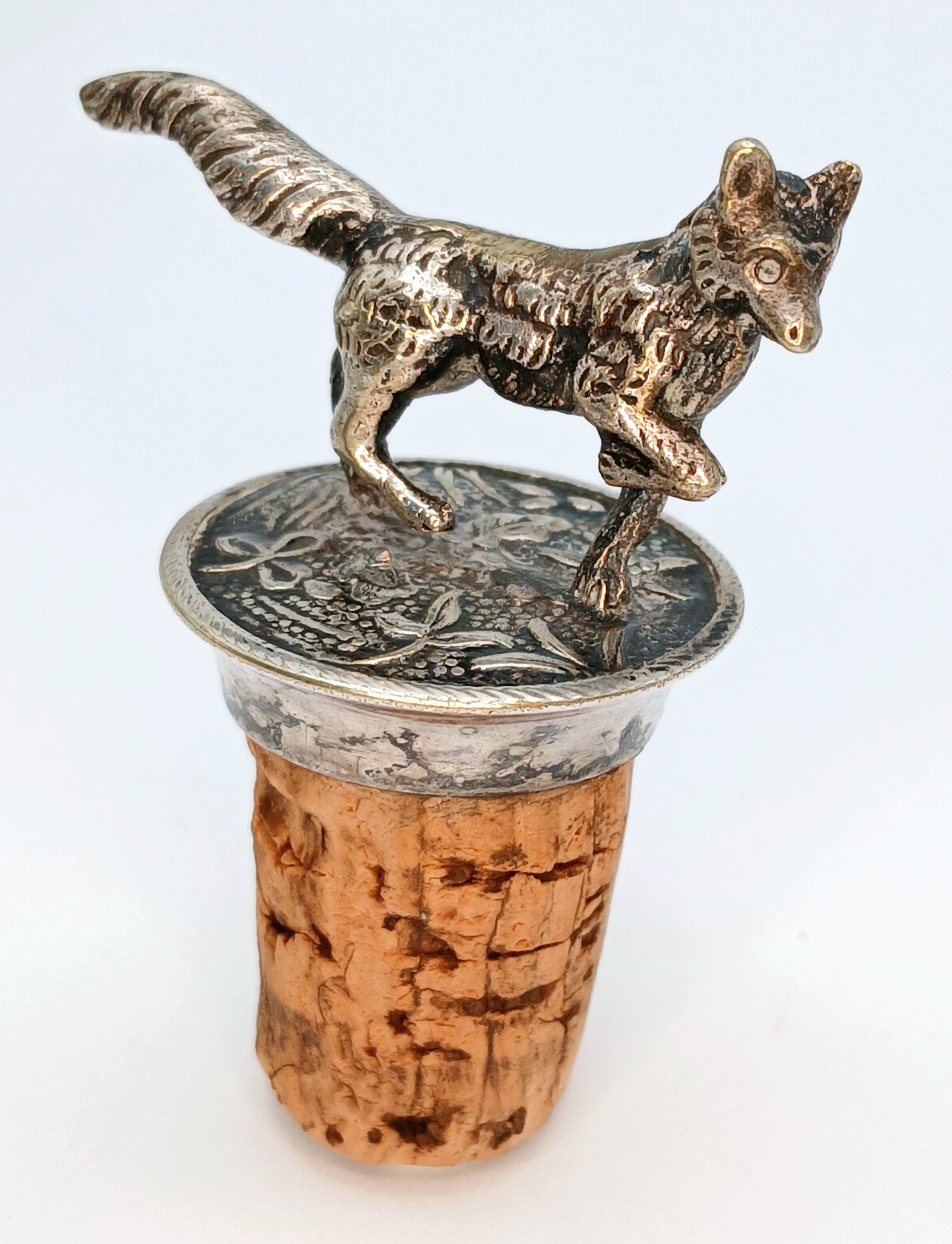 A Vintage Ornate White Metal Fox Bottle Stopper with Cork Base