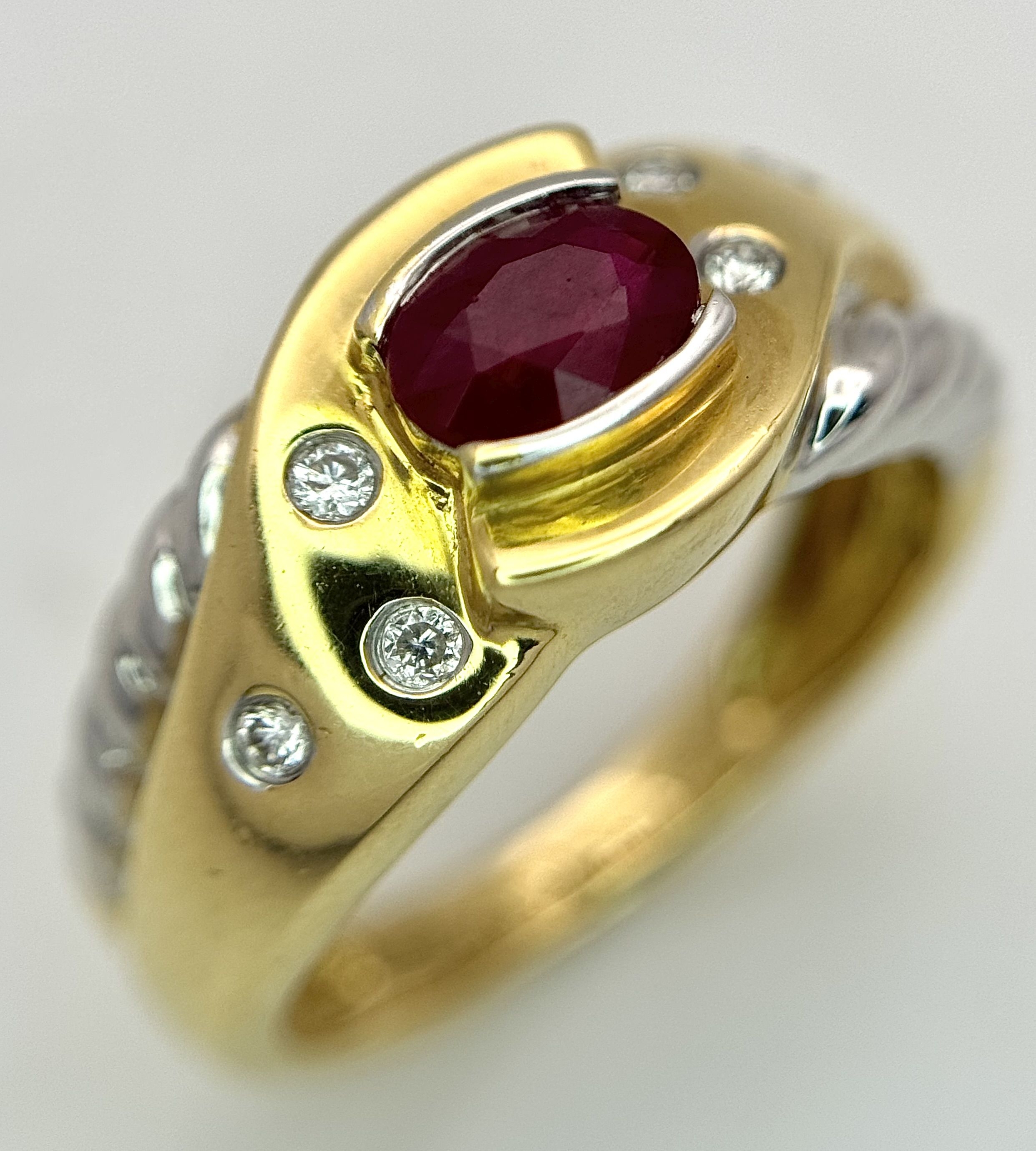 An 18K Yellow Gold Ruby and Diamond Cocktail Ring